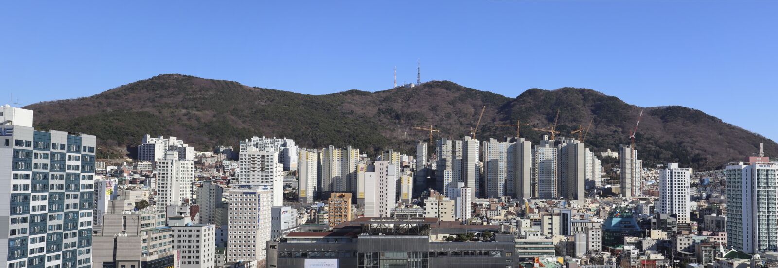 Canon EF-M 15-45mm F3.5-6.3 IS STM sample photo. Apartments, under construction, architecture photography