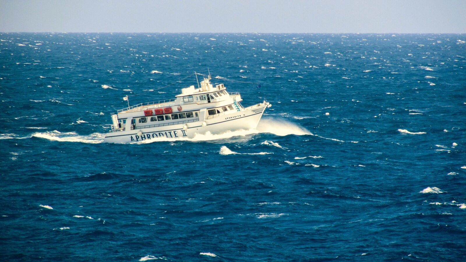 Canon PowerShot SX400 IS sample photo. Boat, storm, heavy sea photography