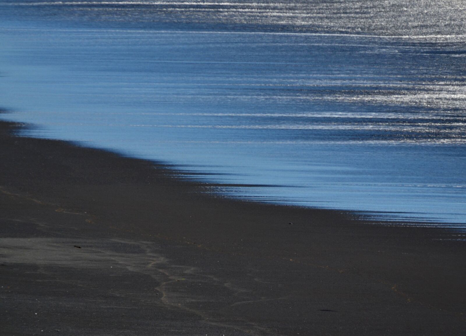 Nikon D3100 sample photo. Black beach, black sand photography