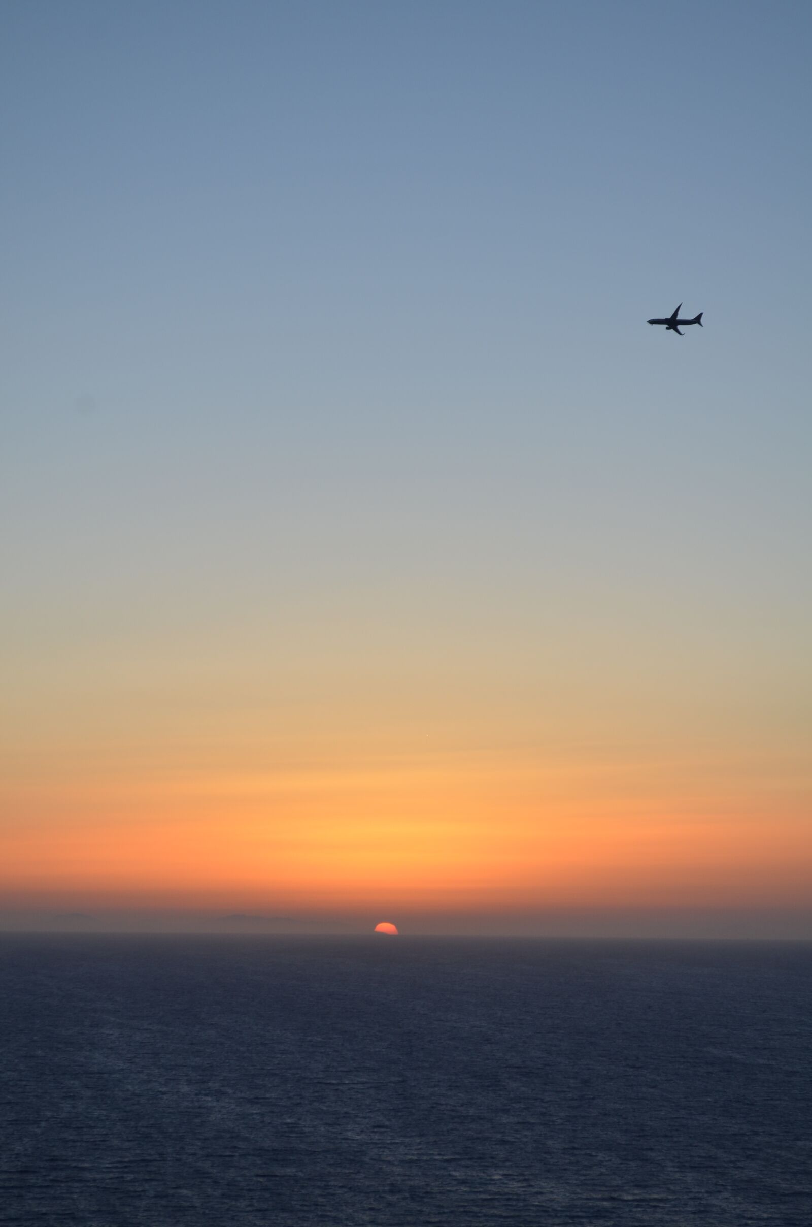Nikon D7000 sample photo. Sunset, island, plane photography