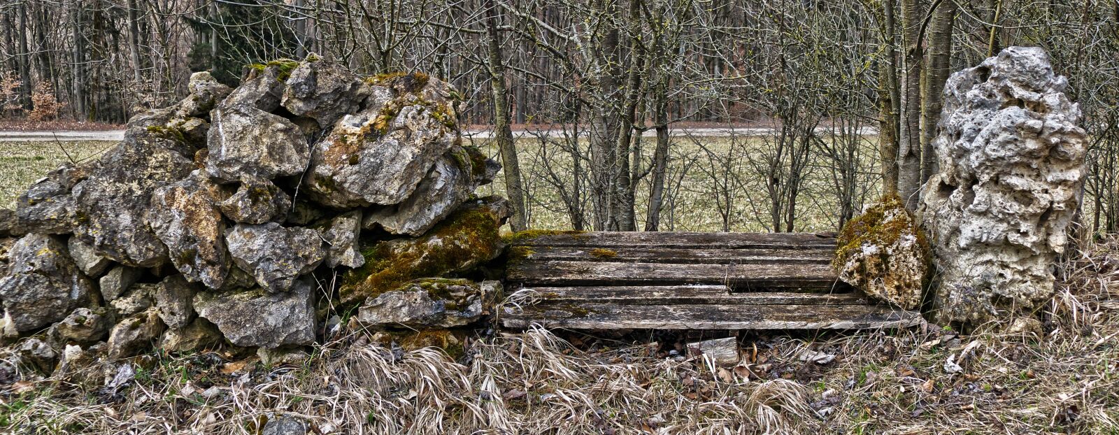 Panasonic Lumix DMC-FZ1000 sample photo. Rock, stones, wooden bench photography