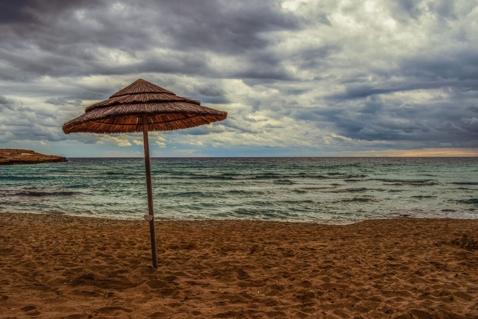 Nikon D3300 sample photo. Beach, empty, umbrella photography