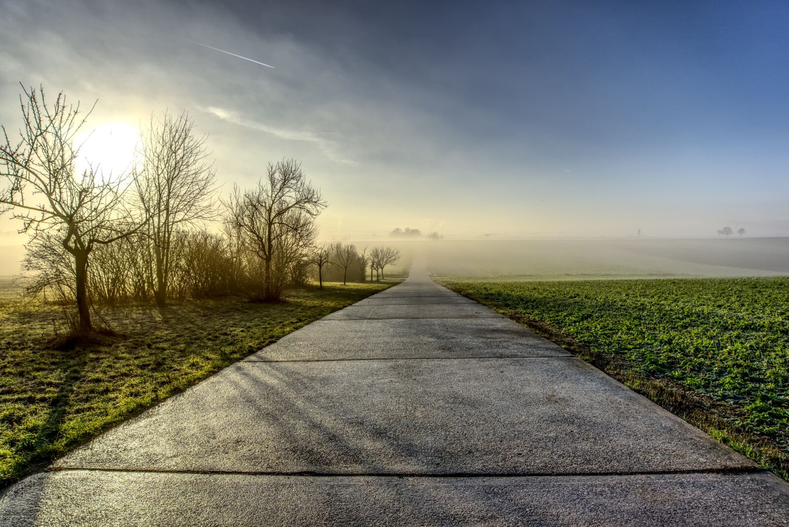 Sony E 16-50mm F3.5-5.6 PZ OSS sample photo. Sunrise, backlighting, road photography
