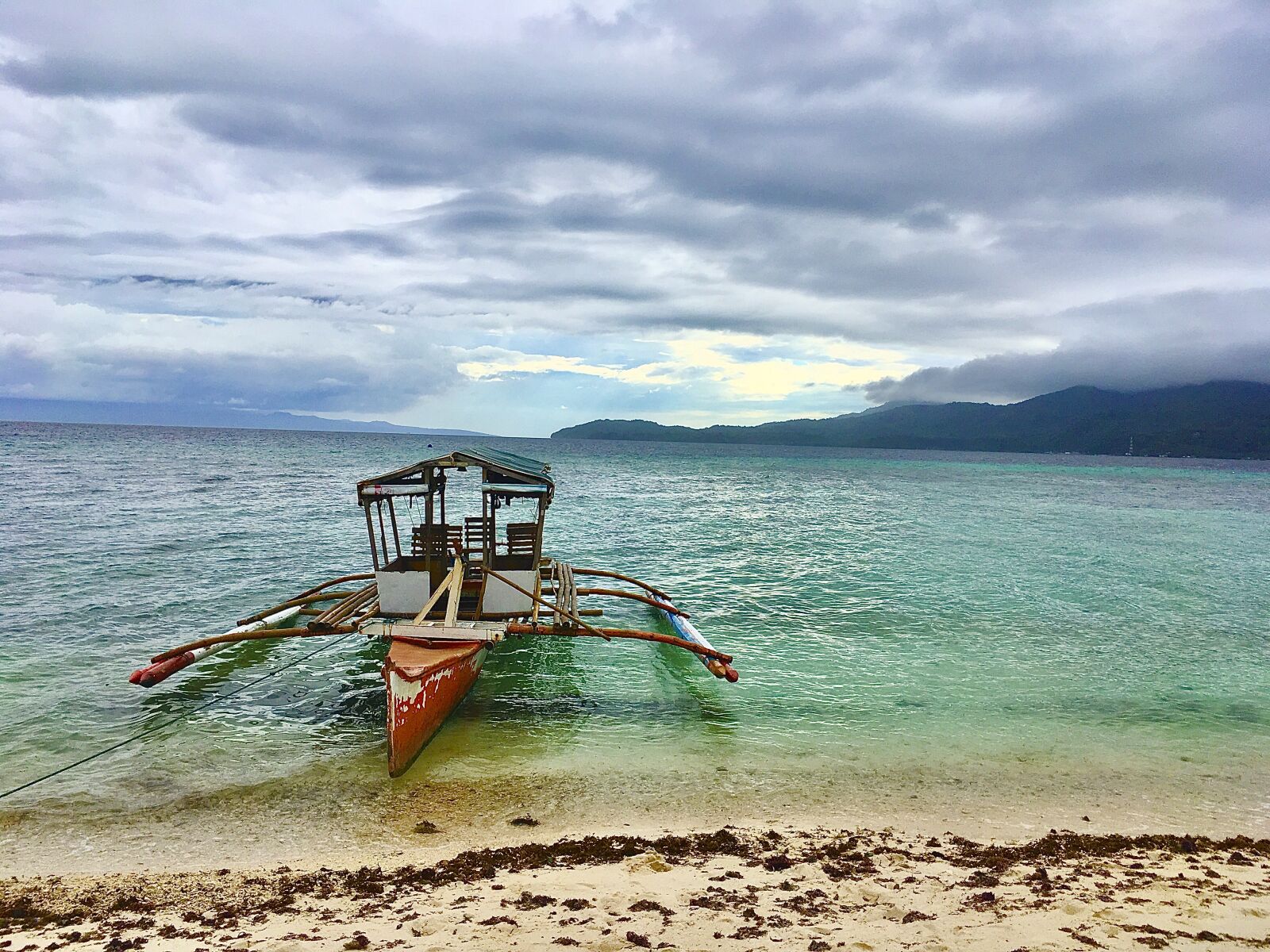 iPhone SE back camera 4.15mm f/2.2 sample photo. Philippines, boat, sea photography