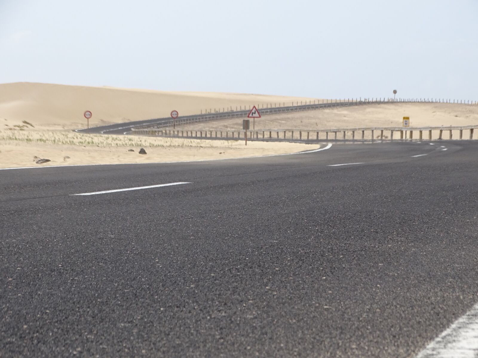 Sony Cyber-shot DSC-HX400V sample photo. Road, sand, wind photography