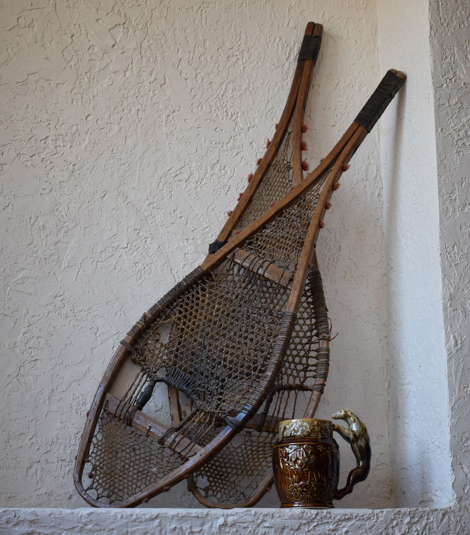 Nikon D3300 sample photo. Antique snowshoes and mug photography