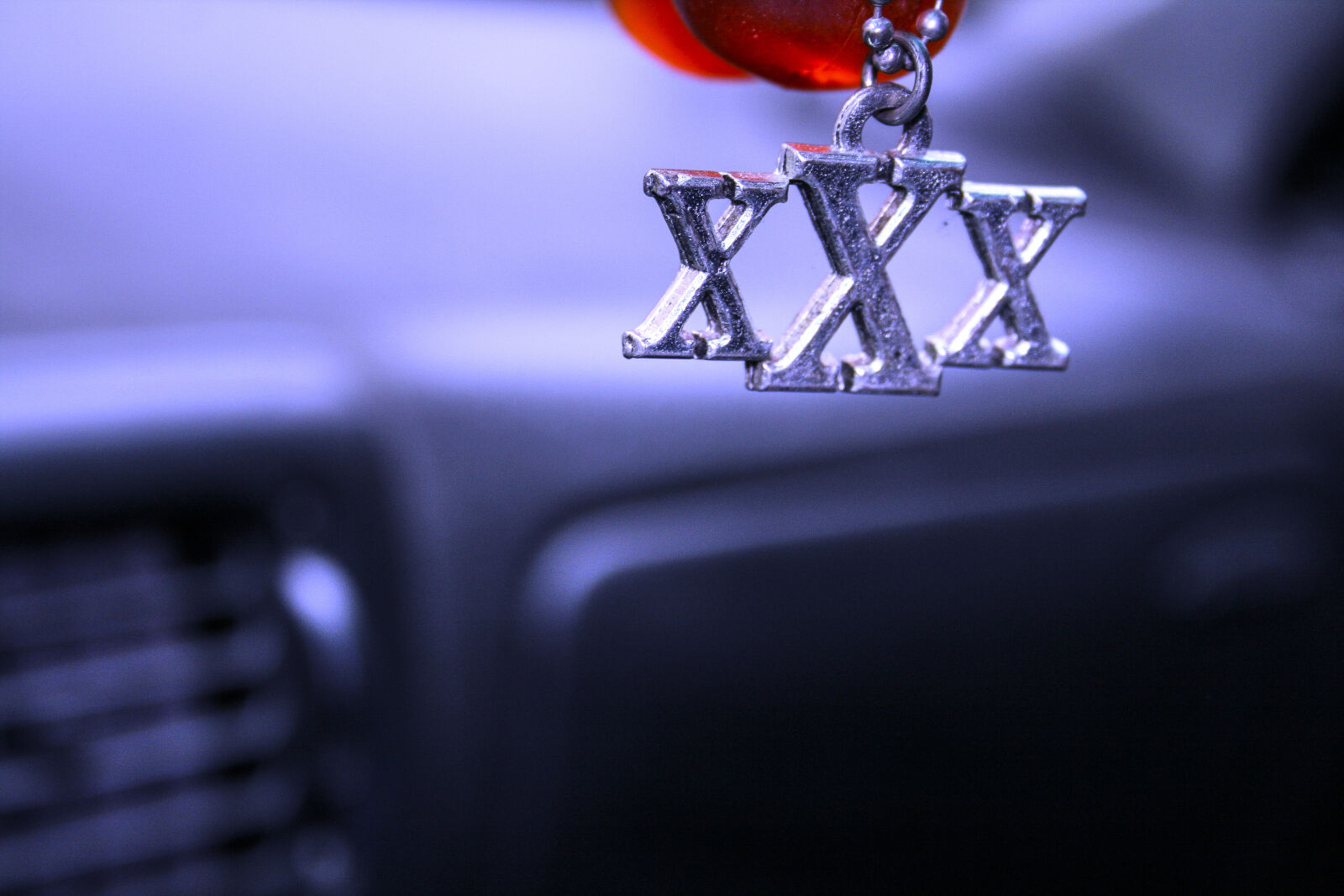 Canon EF-S 18-55mm F3.5-5.6 II sample photo. Blue, blurred, car, metal photography