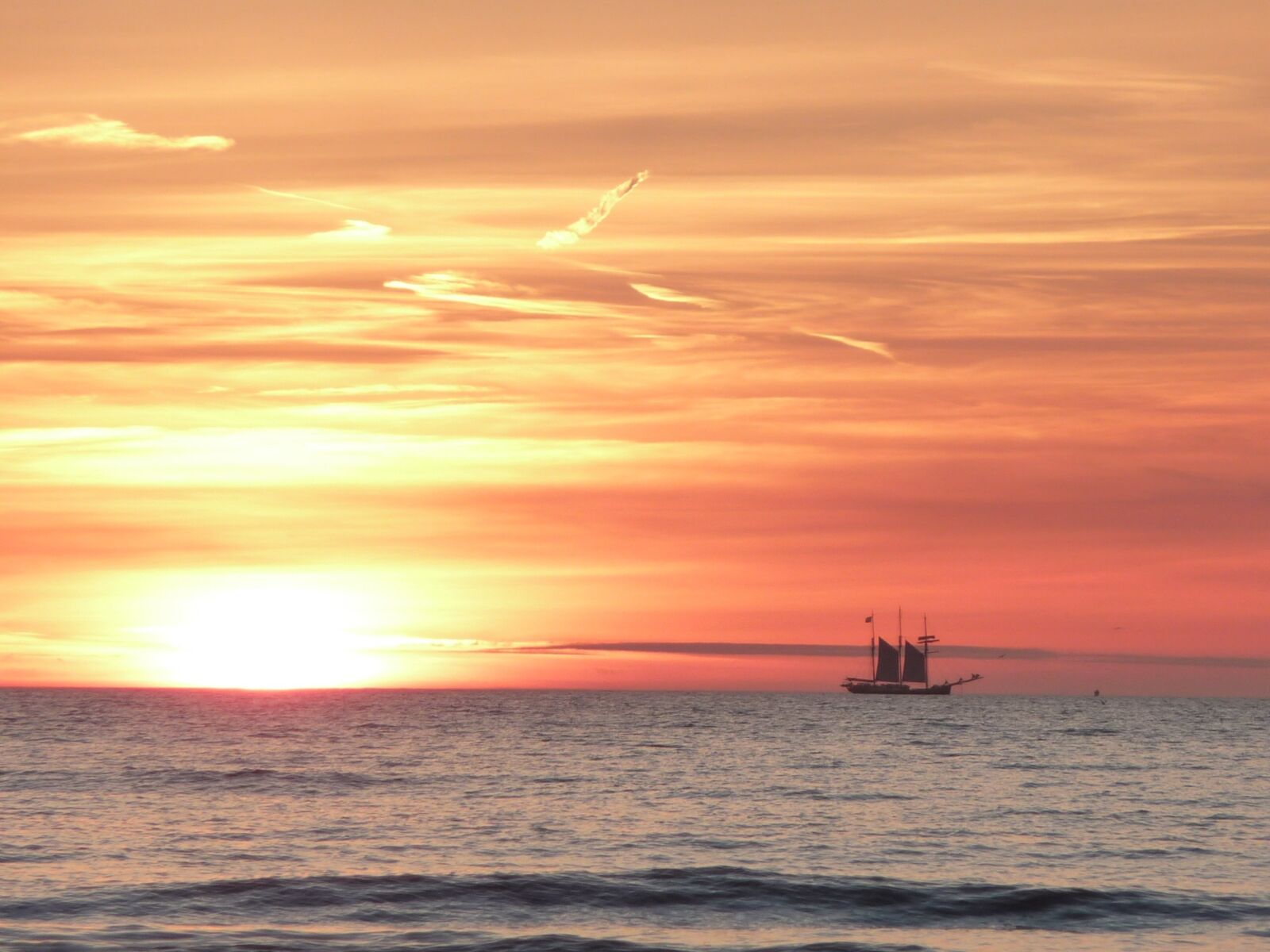 Panasonic Lumix DMC-TZ4 sample photo. Sunset, sailing boat, sea photography