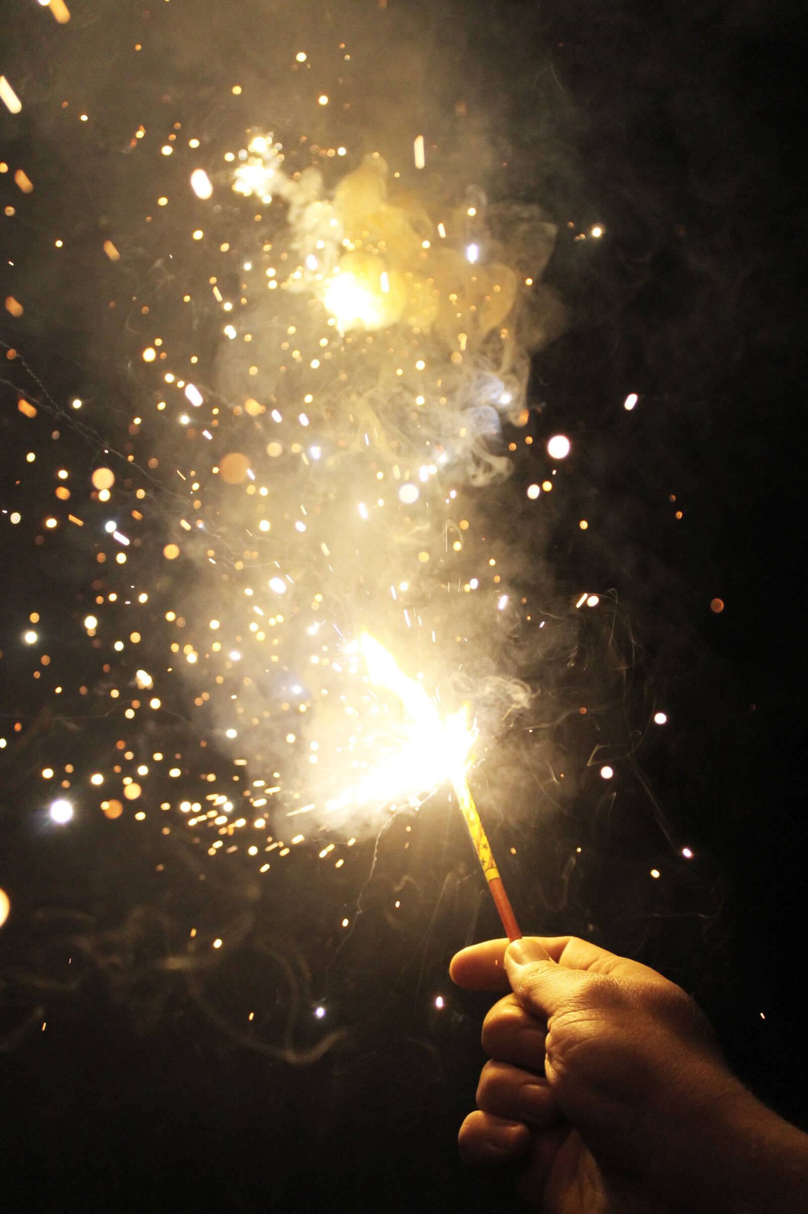 Canon EOS 1100D (EOS Rebel T3 / EOS Kiss X50) sample photo. Explosion, fire, firework, hand photography