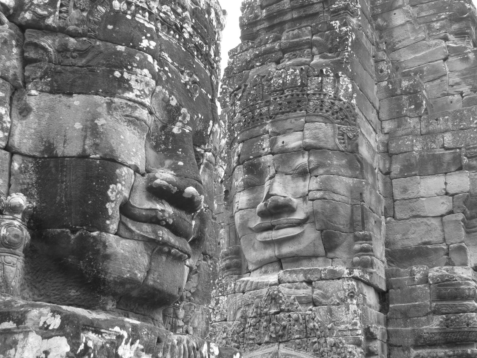 Canon PowerShot SX40 HS sample photo. Stone, faces, gray photography