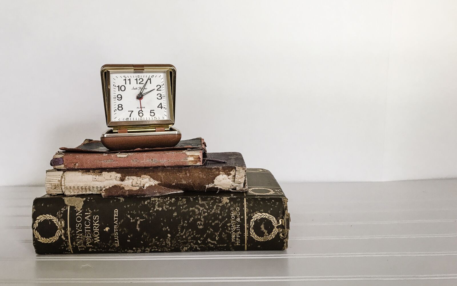Apple iPhone 7 sample photo. Books, clock, vintage photography