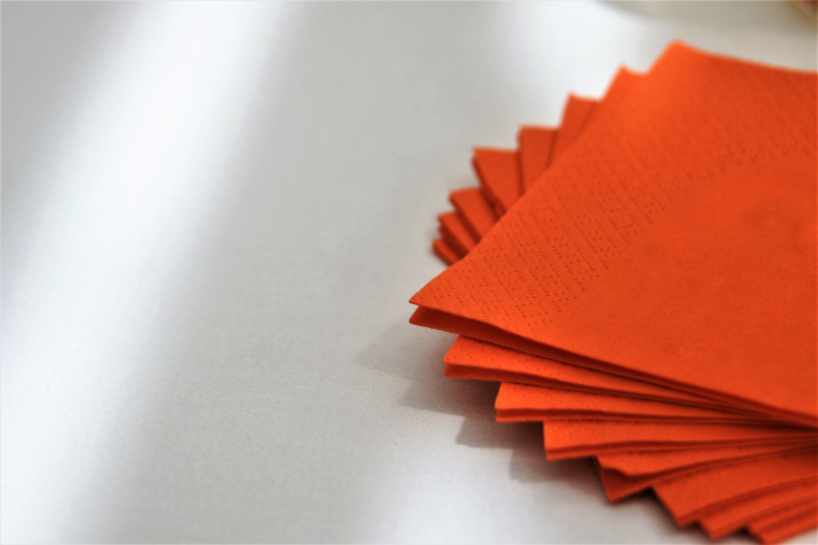 Sony Alpha DSLR-A700 sample photo. Orange, color, napkin photography