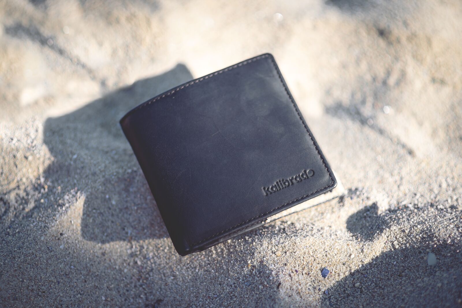 Nikon D610 sample photo. Wallet, sand, beach photography