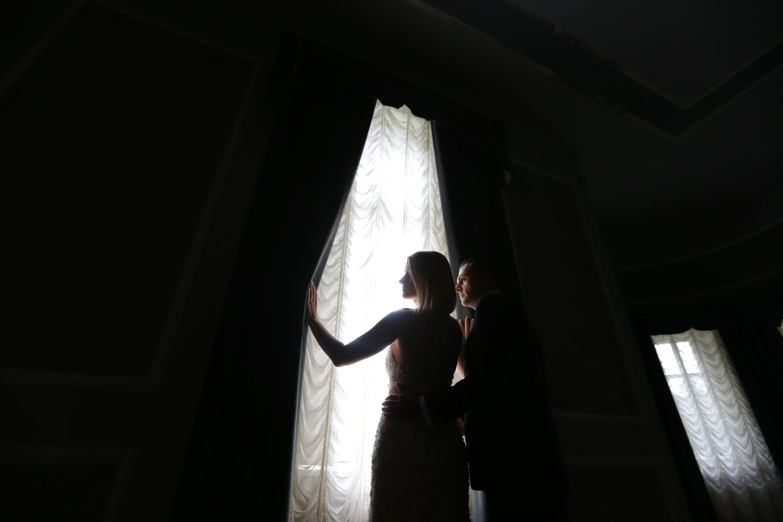 Canon EF 16-35mm F2.8L II USM sample photo. Darkness, man, light, wife photography