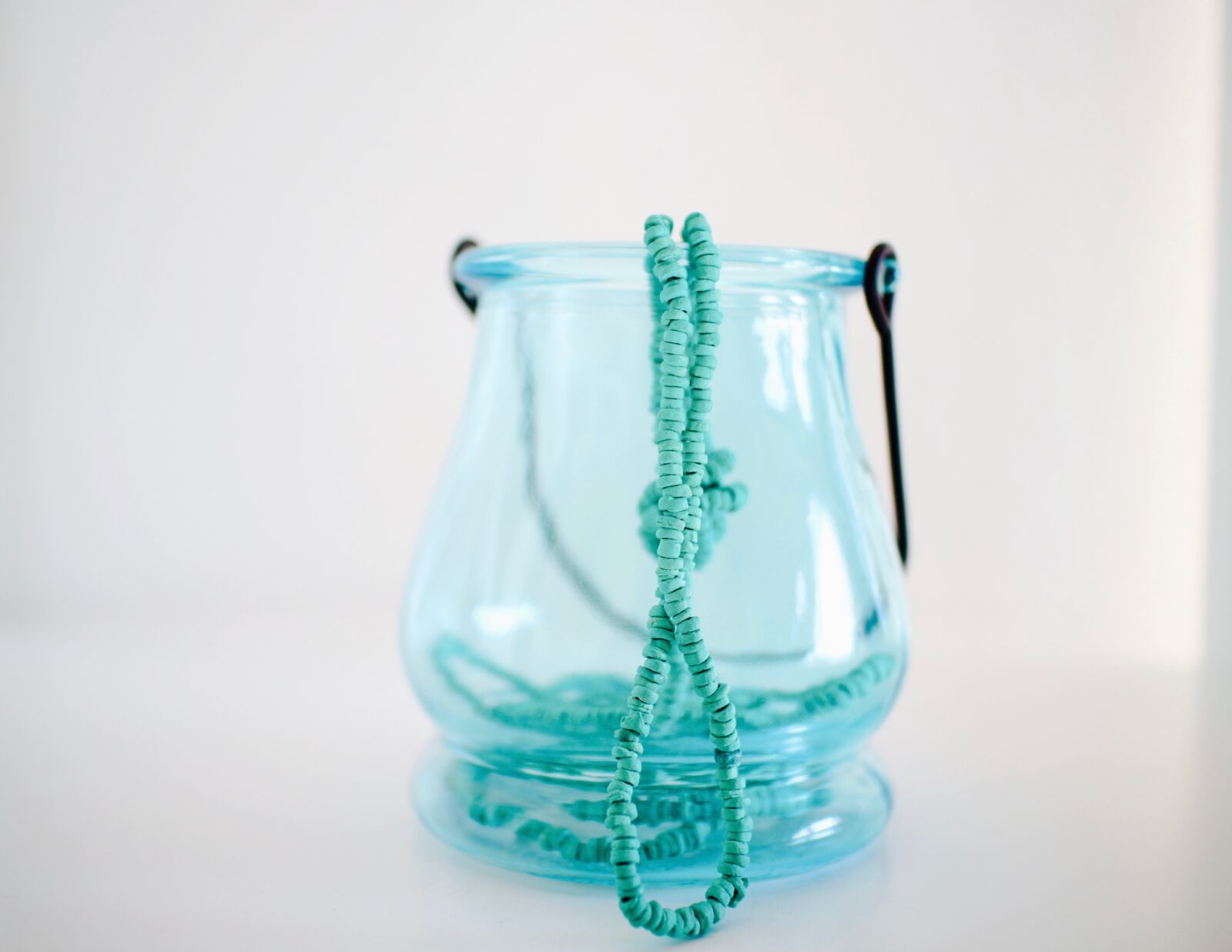 Canon EF-M 22mm F2 STM sample photo. Colored glass, necklace, blue photography