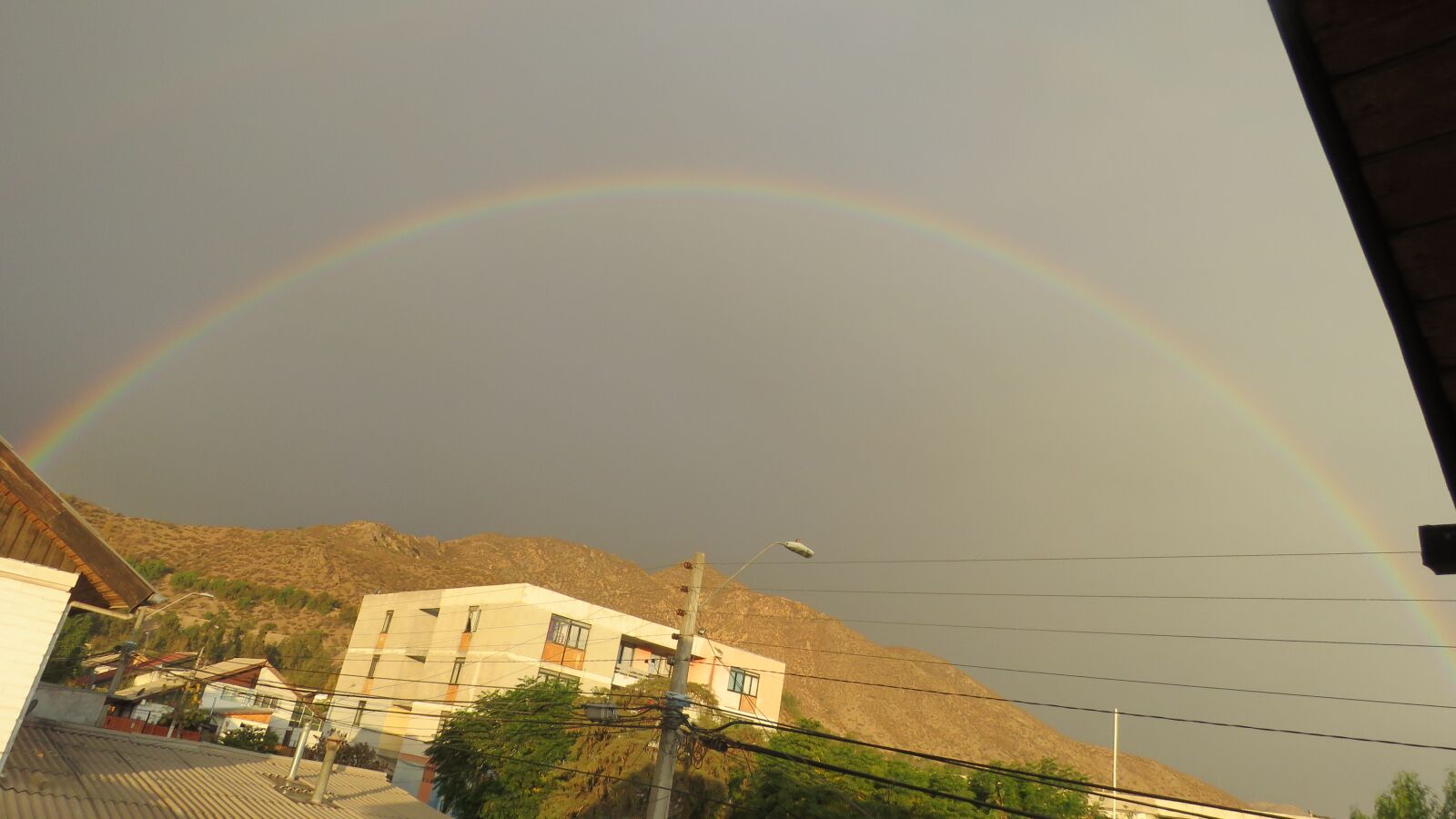 Canon PowerShot SX60 HS sample photo. Rainbow, the andes, urban photography