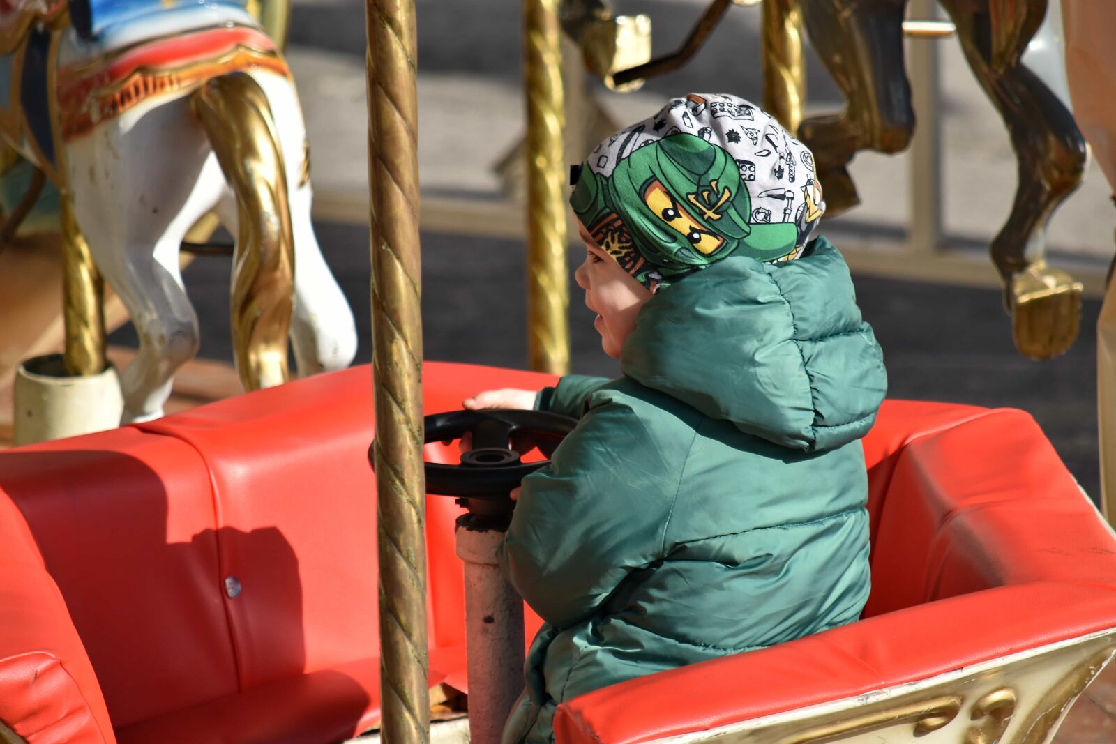 Nikon D5500 sample photo. Amusement, carnival, carousel, child photography