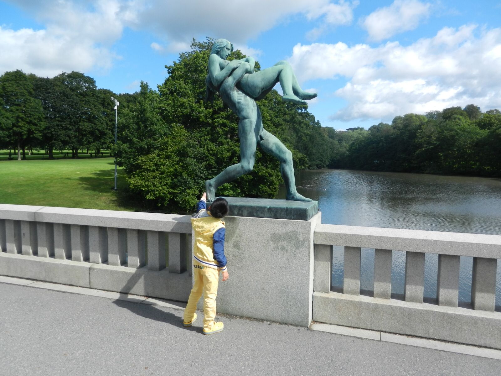 Nikon Coolpix S9100 sample photo. Sculpture, run, hold back photography
