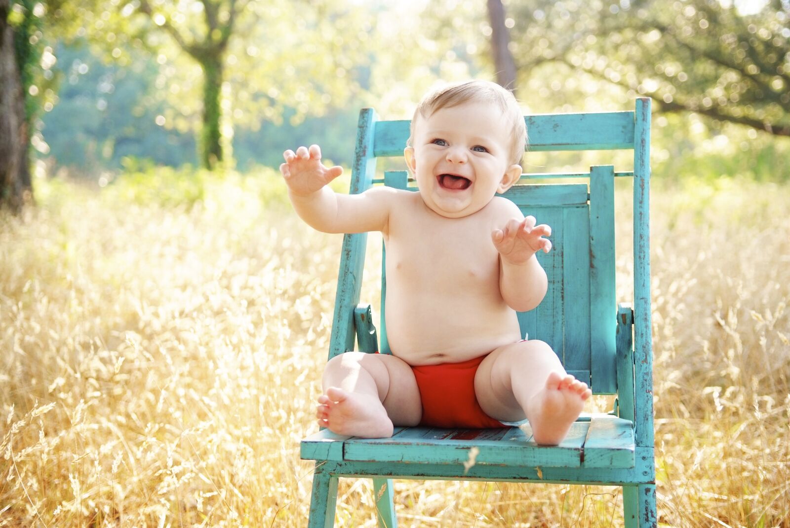 Fujifilm FinePix S5 Pro sample photo. Baby, sitting, smiling photography