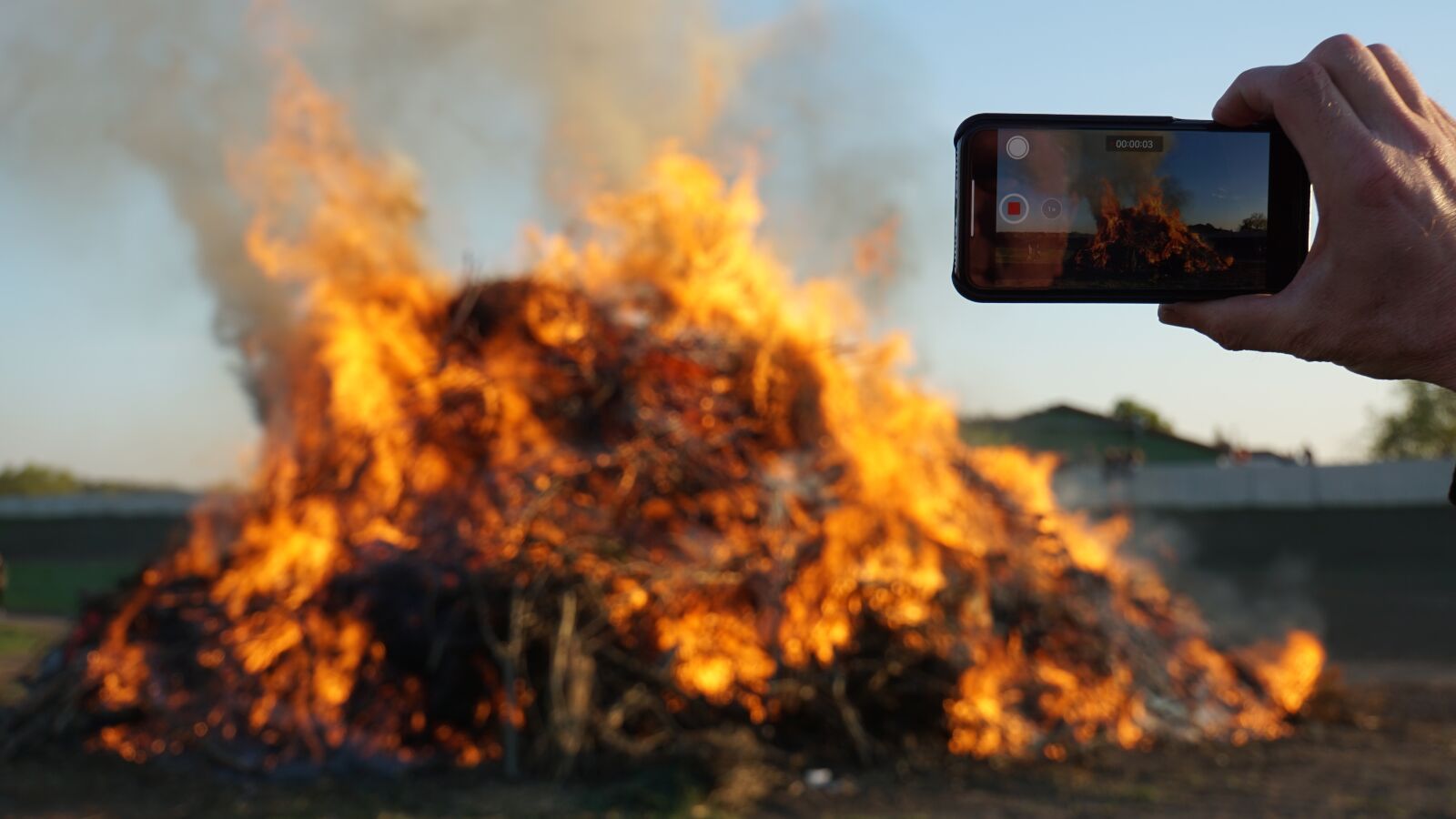 Sony E 18-200mm F3.5-6.3 OSS LE sample photo. Easter fire, film, iphone photography