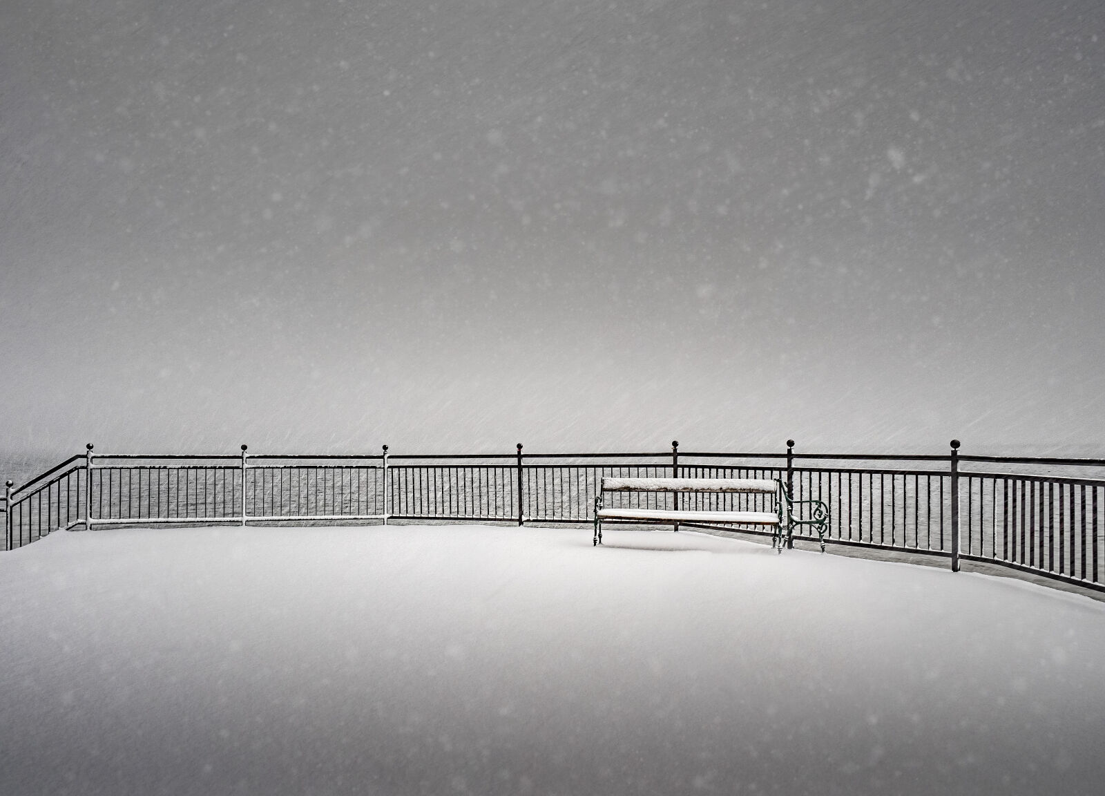 Olympus M.Zuiko Digital ED 12-40mm F2.8 Pro sample photo. Snow, covered, bench, on photography