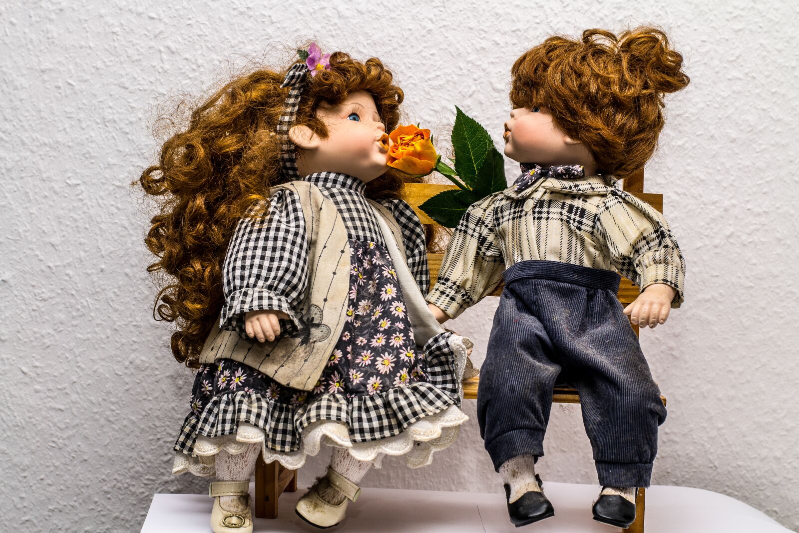 Nikon D3100 sample photo. Bank, sit, dolls photography
