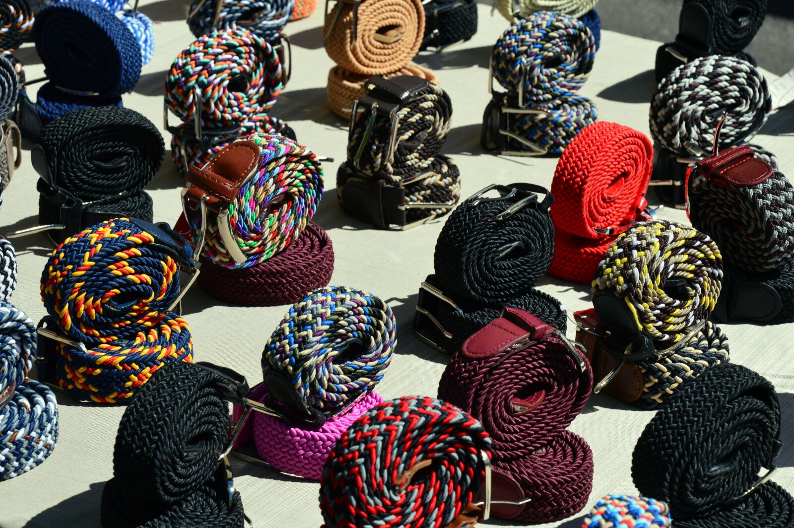 Nikon D3200 sample photo. Belts, spread, market photography