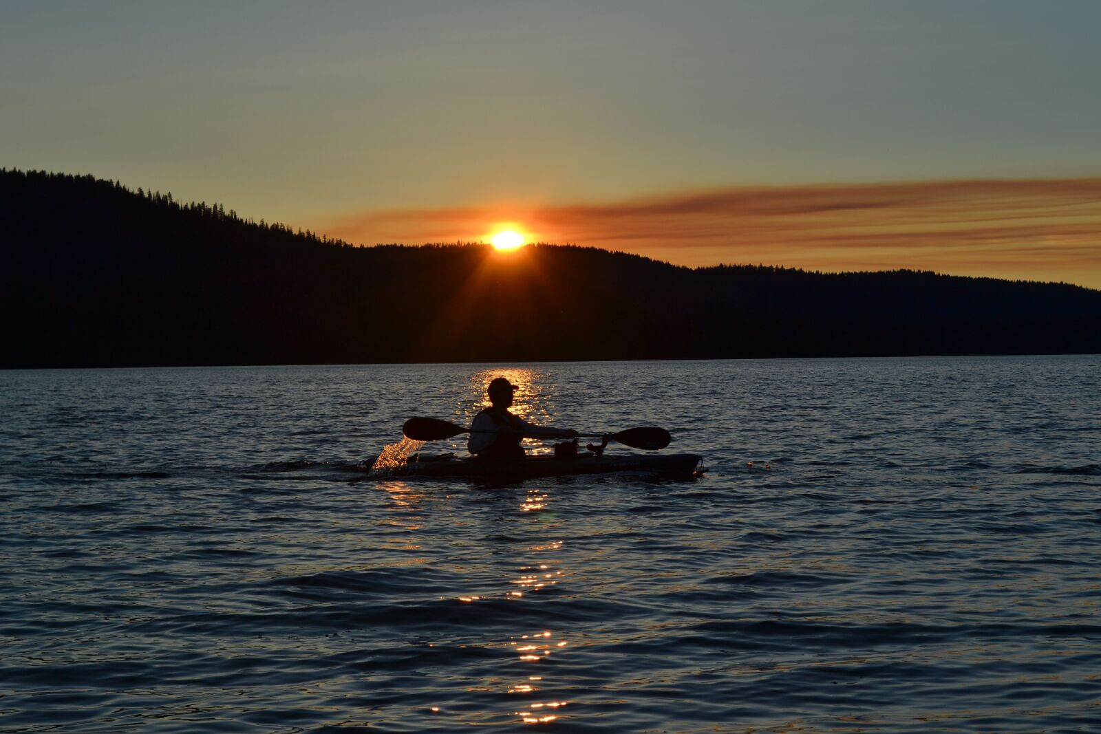 Nikon D3100 sample photo. Sunset, mountains, kayak photography