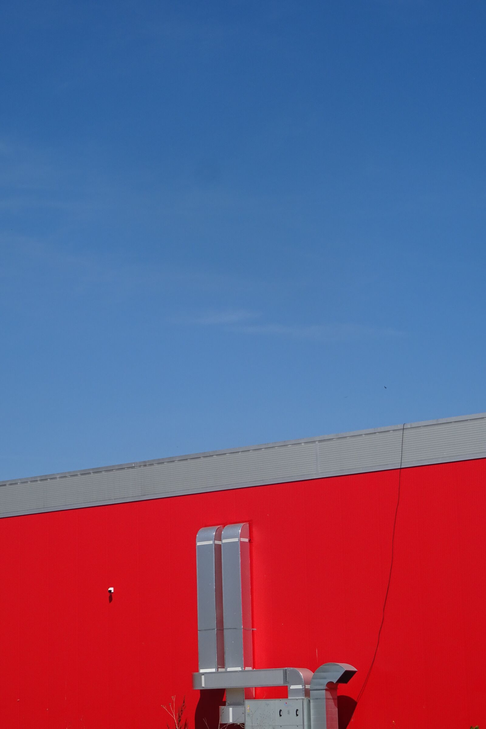 Sony DSC-HX60 sample photo. Red, blu, sky photography