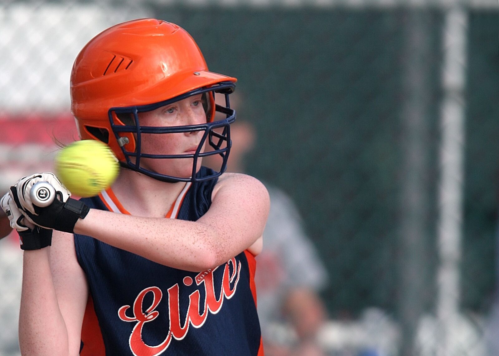 Canon EOS 20D sample photo. Softball, batter, female photography