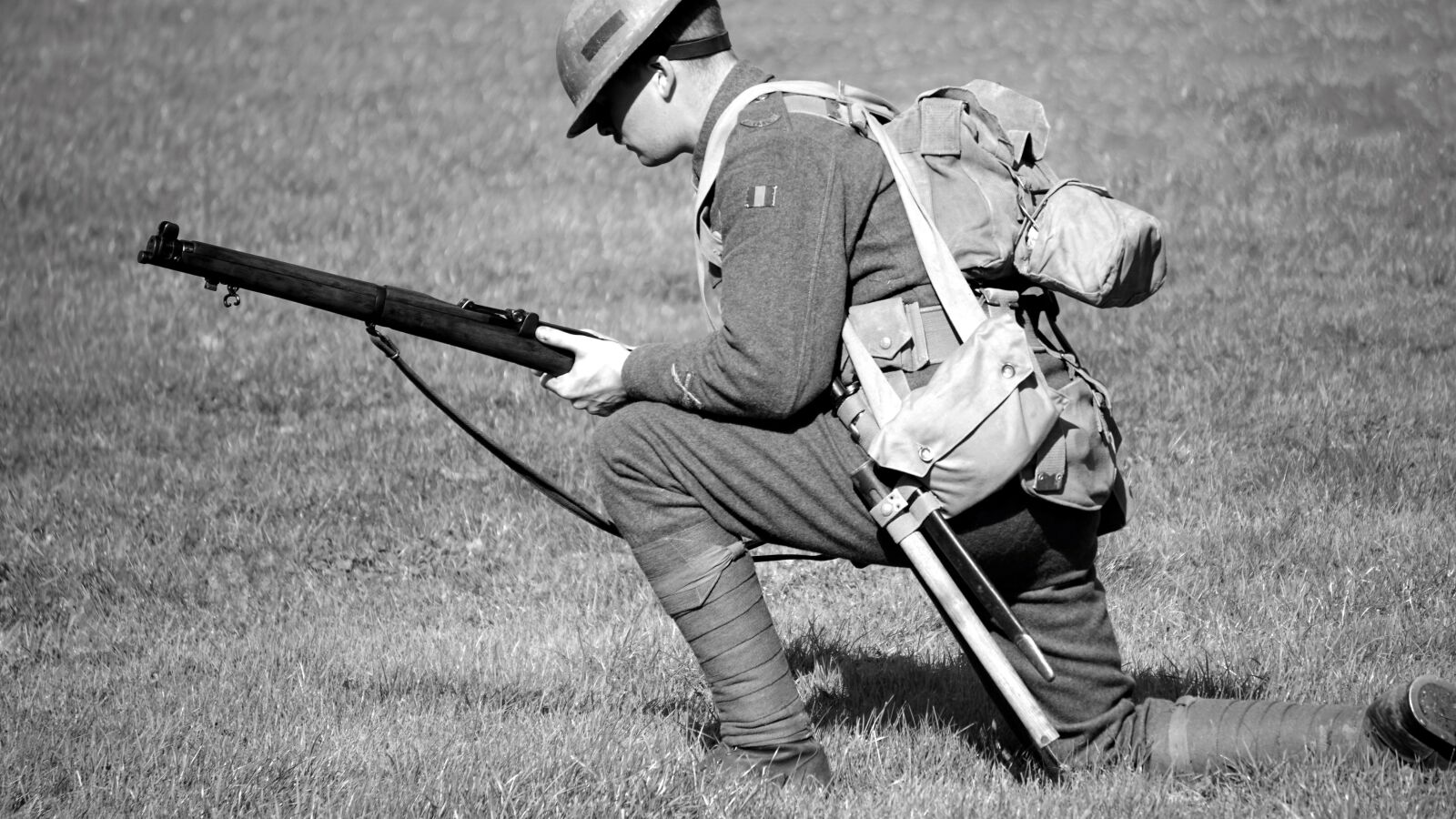 Sony E 55-210mm F4.5-6.3 OSS sample photo. Soldier, gun, military photography