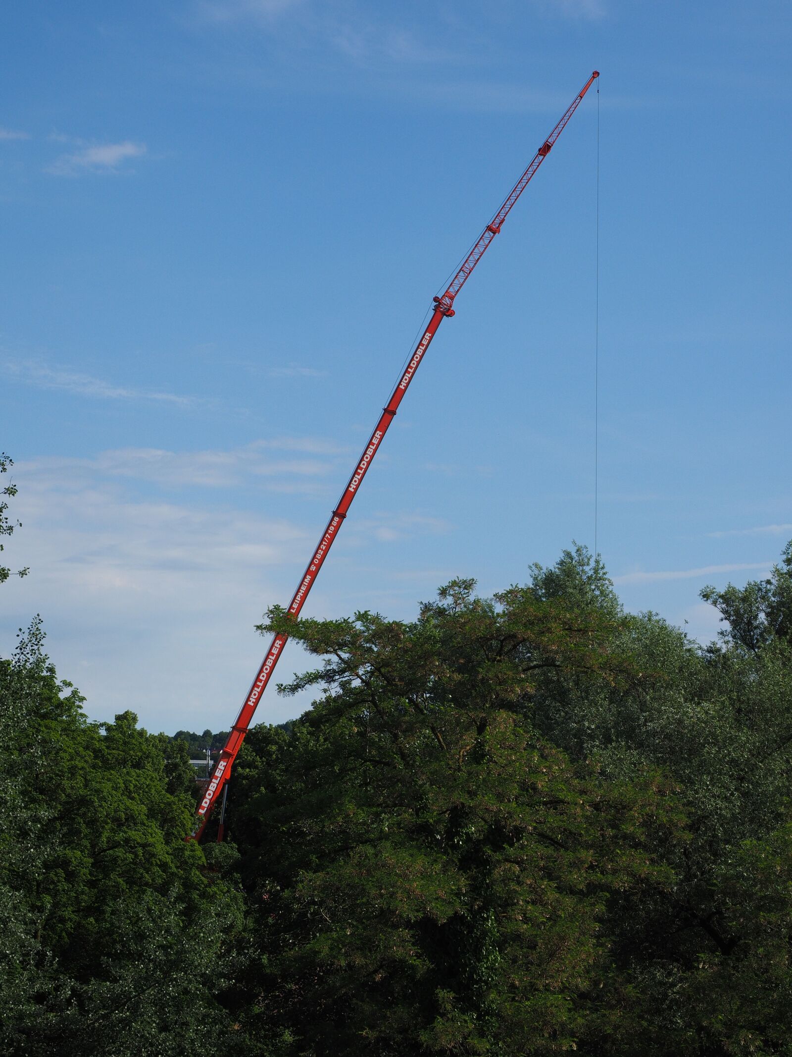 Olympus OM-D E-M1 + Olympus M.Zuiko Digital ED 12-40mm F2.8 Pro sample photo. Crane, baukran, load crane photography