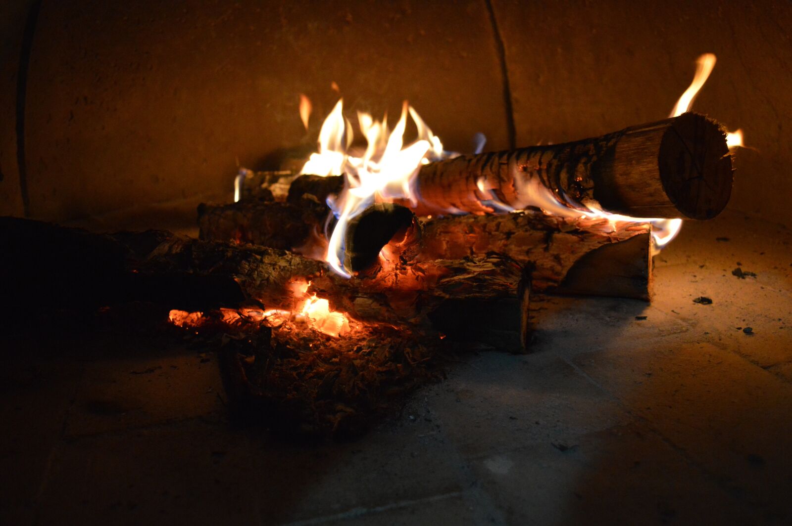 Nikon D3200 sample photo. Fire, firewood, wood stove photography