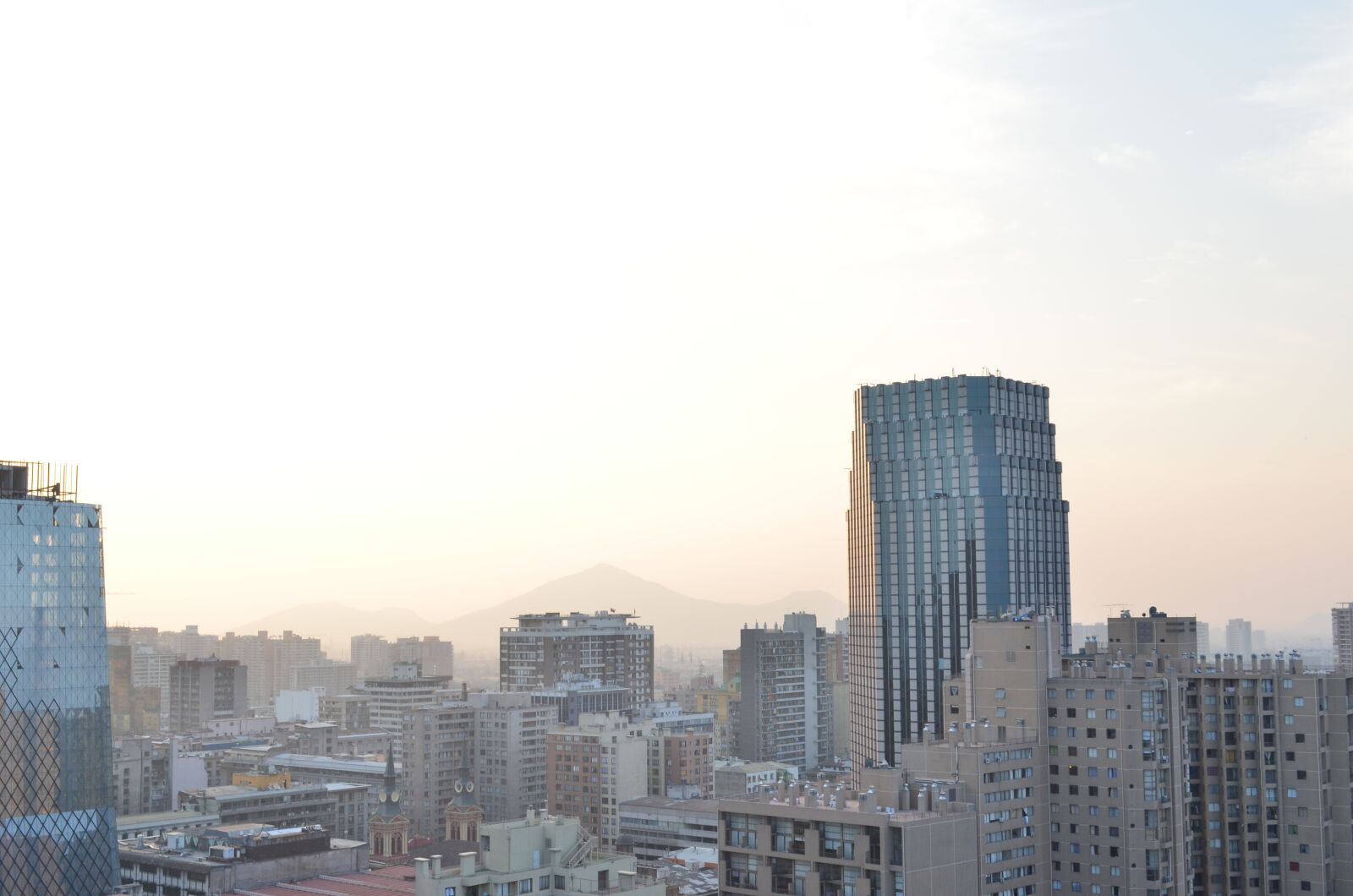 Nikon D5100 sample photo. Clouds, mountain, city photography