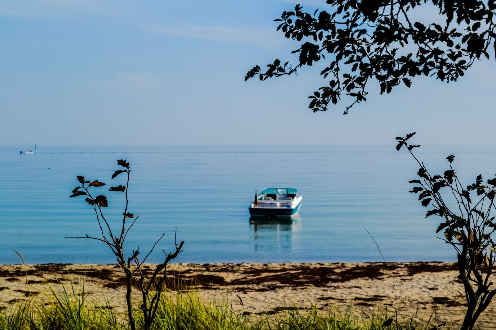 Nikon D3100 sample photo. Sea, boat, beach photography