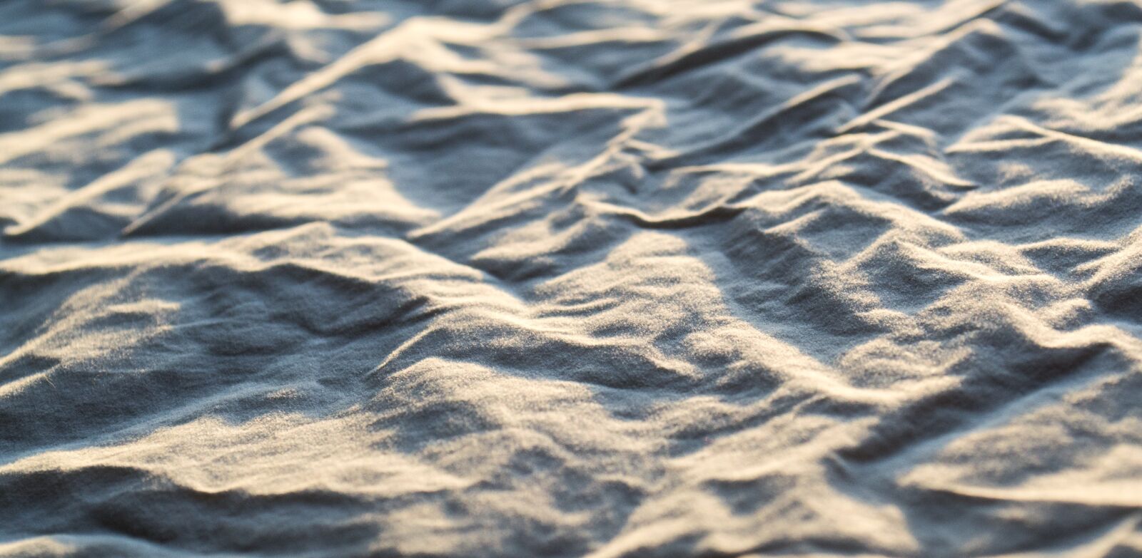 Nikon D3100 sample photo. Wave, abstract, bed sheet photography