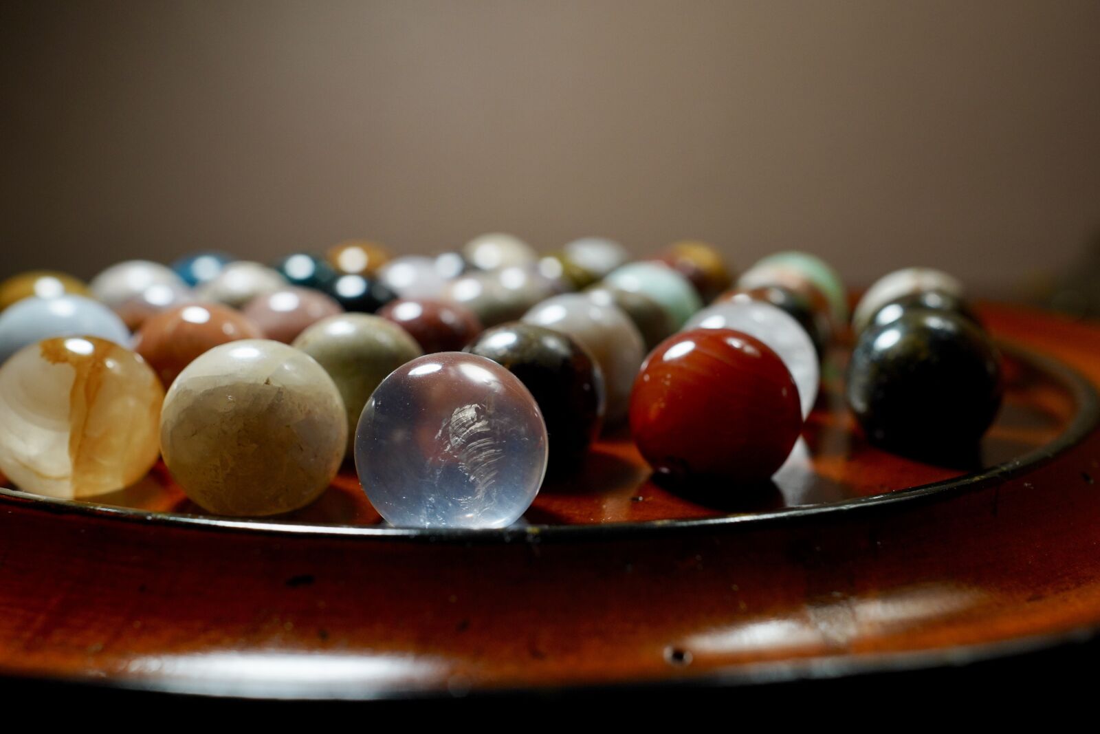 Sony Sonnar T* E 24mm F1.8 ZA sample photo. Marbles, game, stones photography