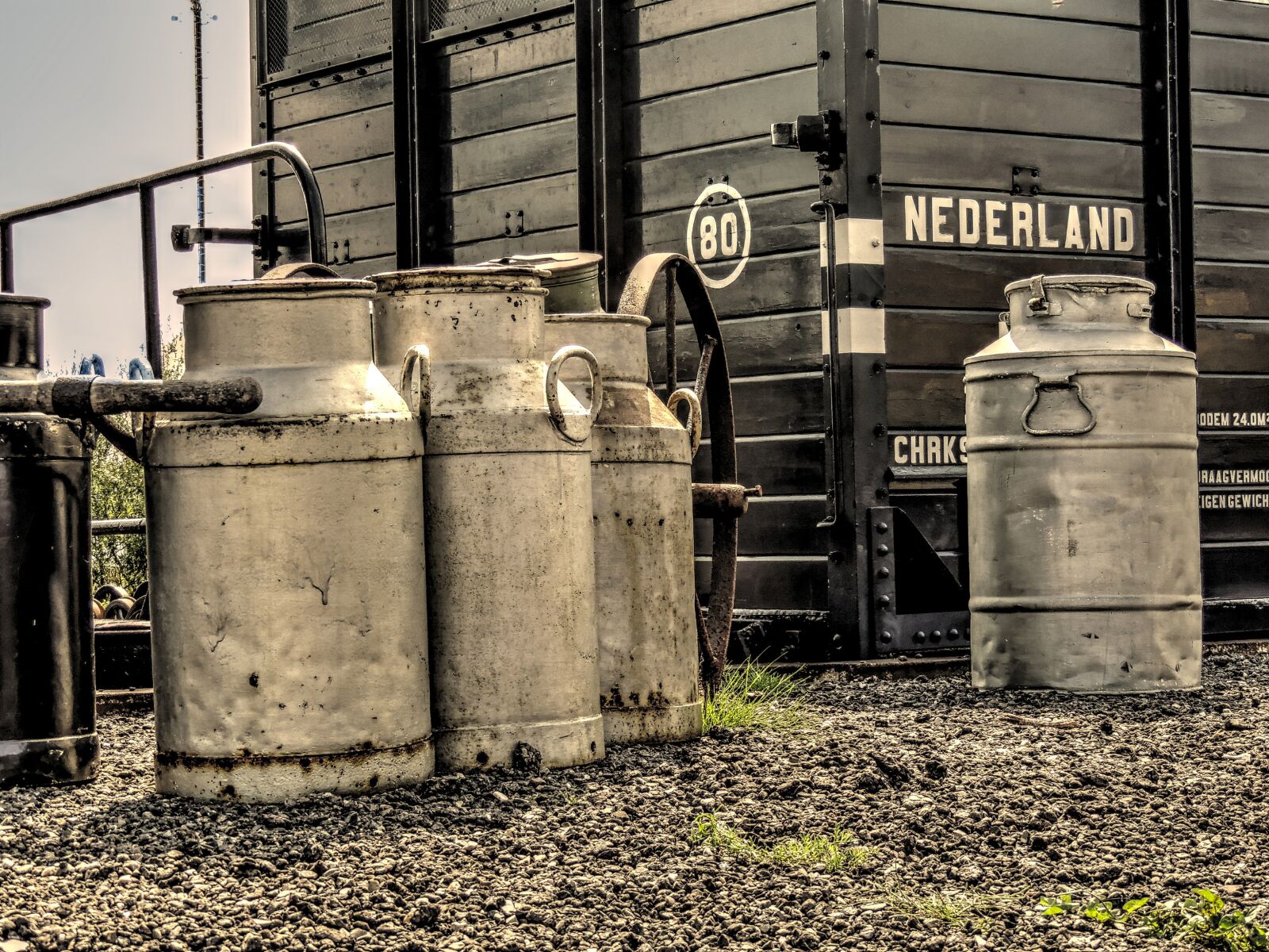 Nikon Coolpix P510 sample photo. Churns, milk churn, platform photography