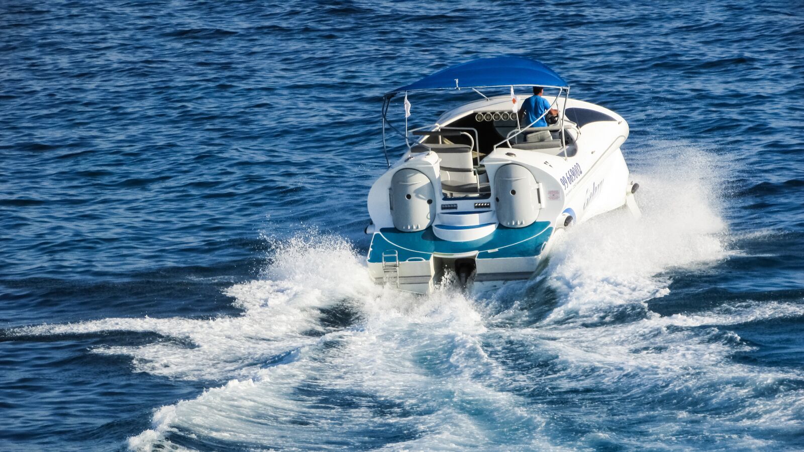 Canon PowerShot SX400 IS sample photo. Speed boat, sea, water photography