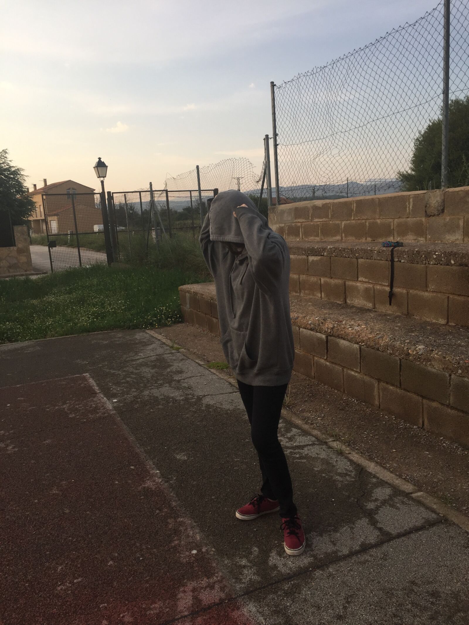 iPhone 6 back camera 4.15mm f/2.2 sample photo. Person, hood, bars photography