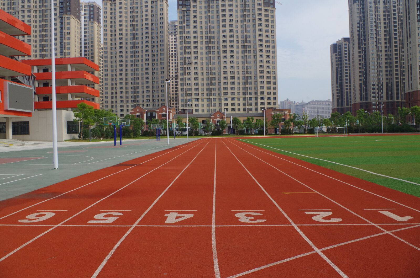 Pentax K-50 sample photo. Junior, playground, athletic track photography