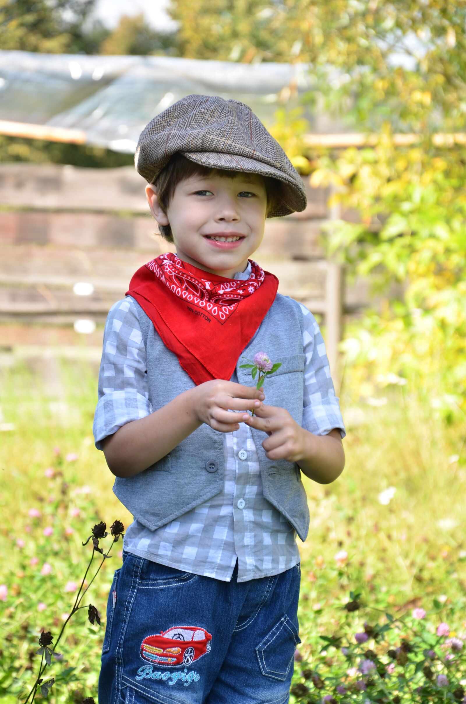 Nikon D7000 sample photo. Boy, flower, clover photography