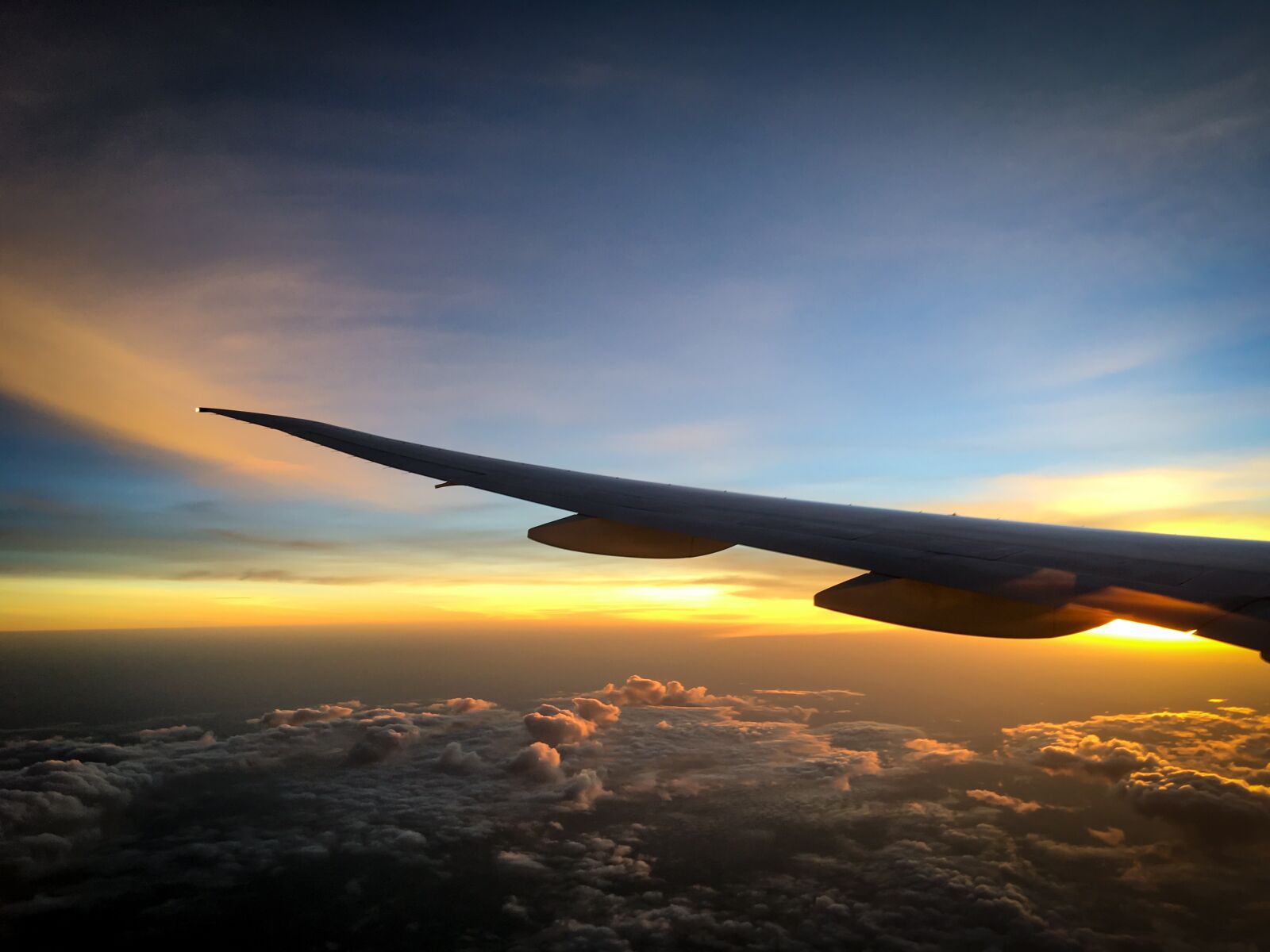 Apple iPhone 6s Plus sample photo. Flight, clouds, travel photography