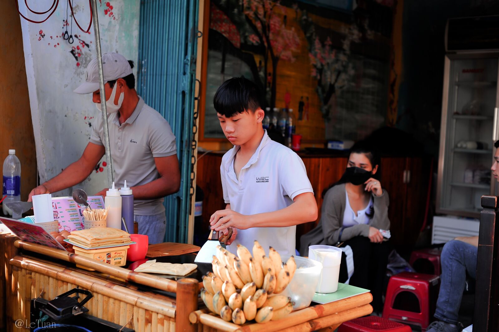 Nikon D700 sample photo. Hoi an, hawkers, baby photography