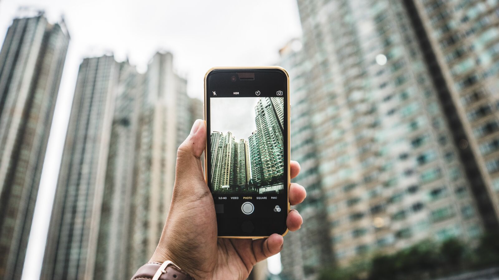 Sony a7 + Sony FE 28-70mm F3.5-5.6 OSS sample photo. Apple device, blur, buildings photography