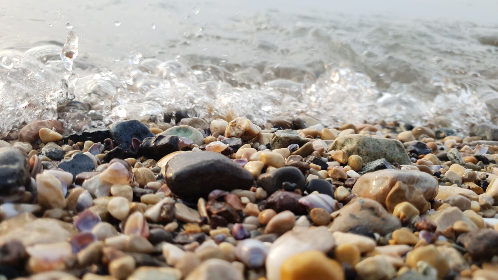 Samsung Galaxy S9 sample photo. Stones, water, garda photography