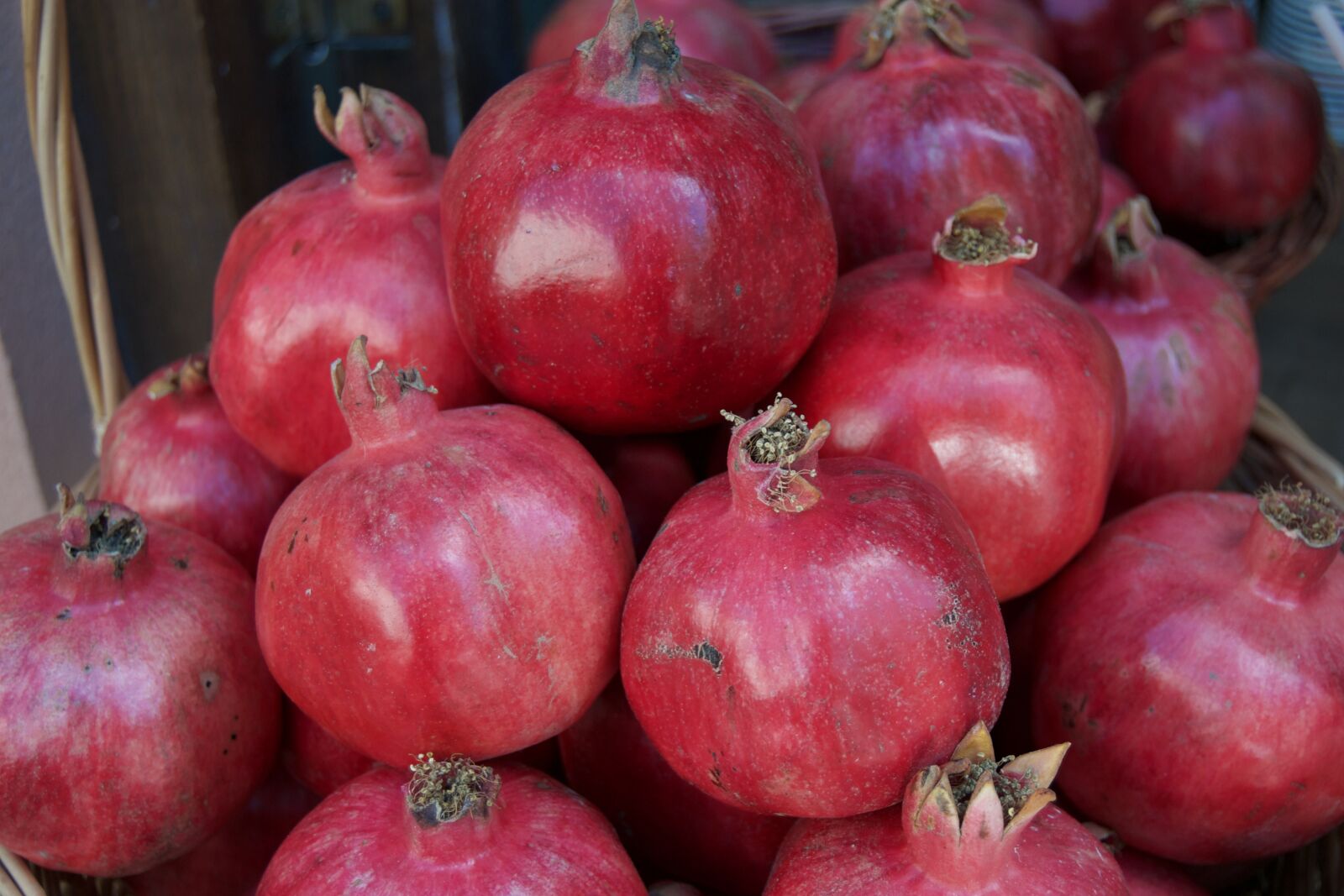 Nikon D3100 sample photo. Pomegranates, pink, fruit photography