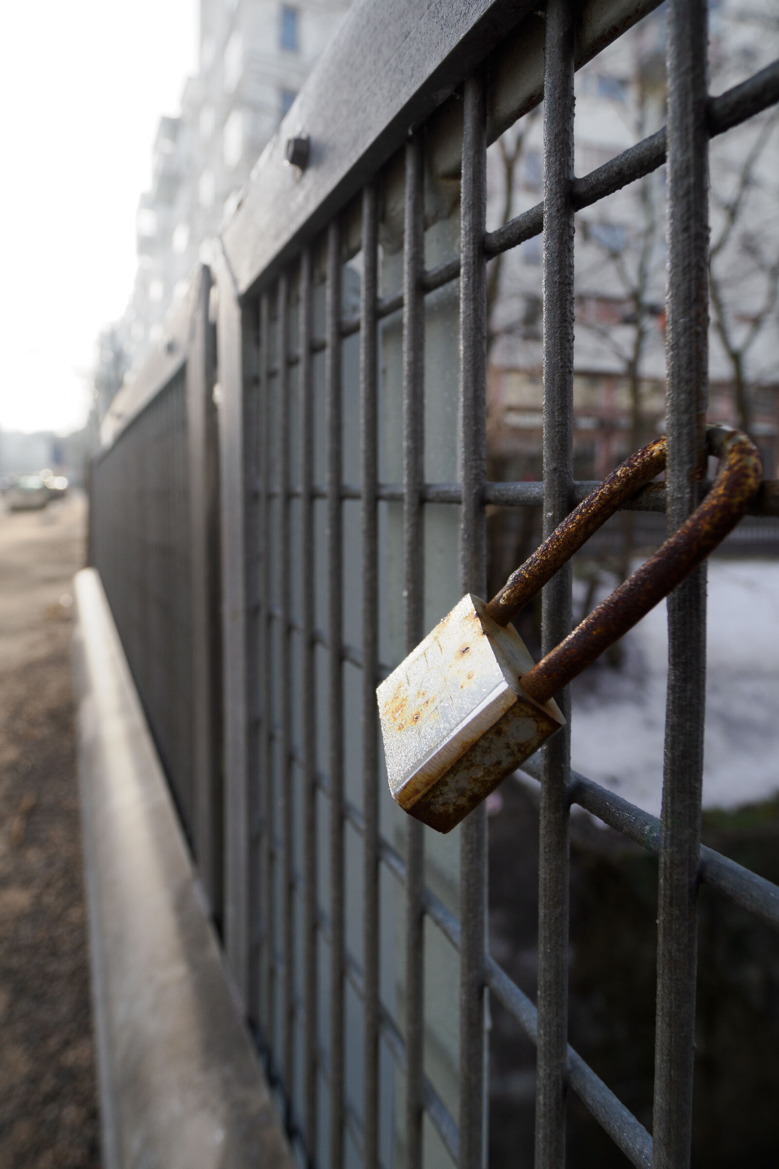OM System OM-1 Mark II sample photo. Padlock fence photography
