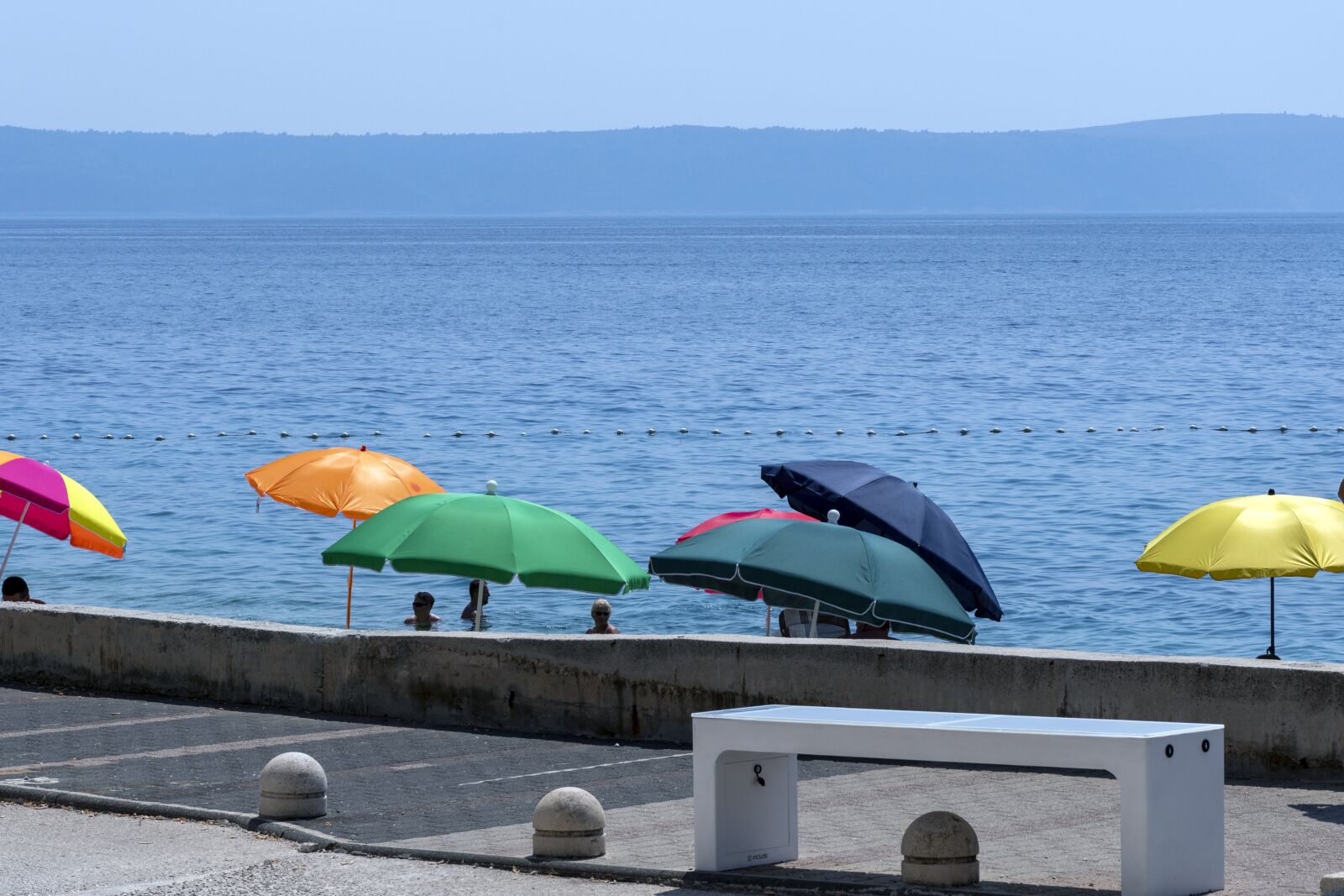 Nikon D7500 sample photo. Umbrellas, shadow, seaside photography