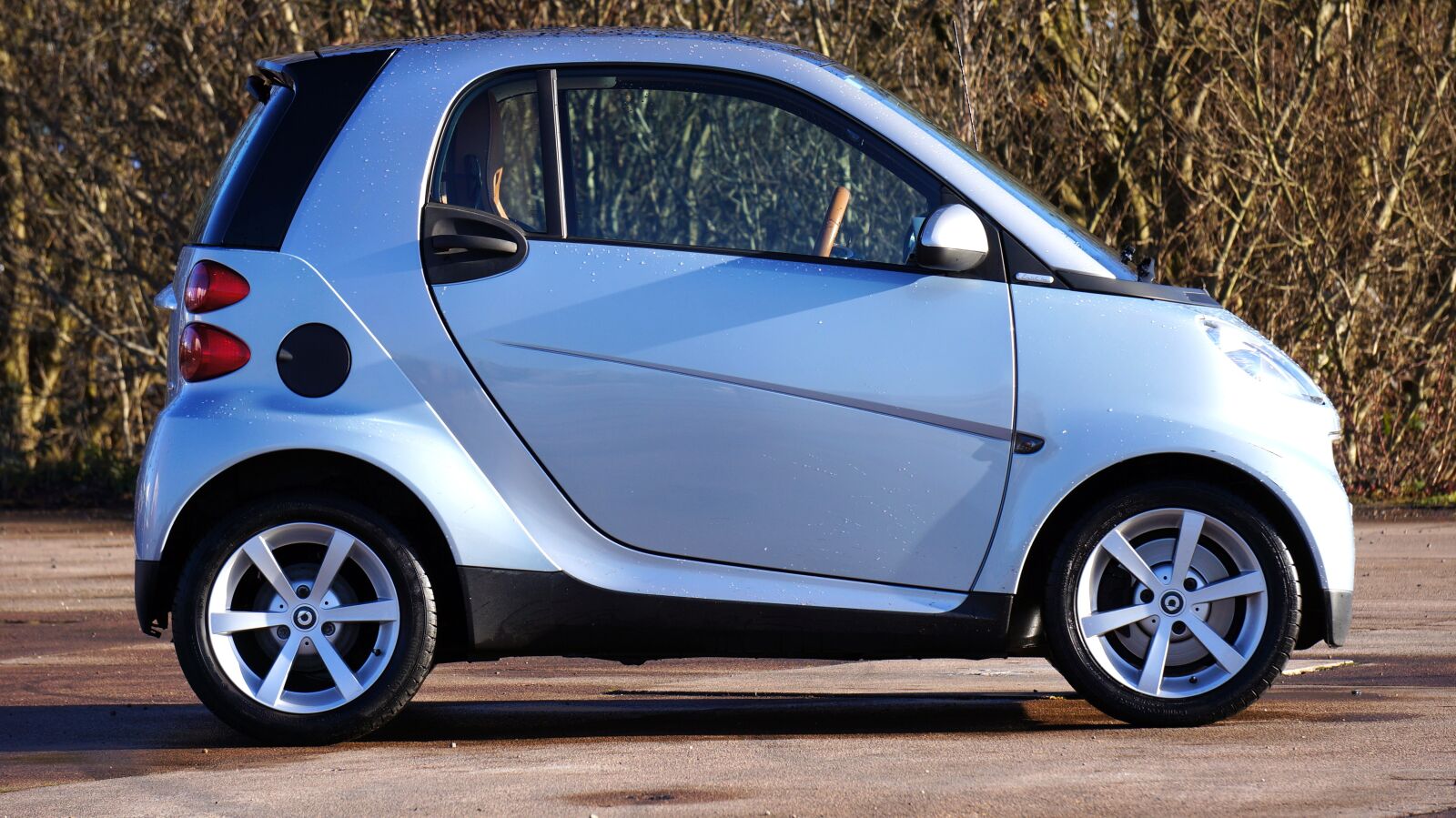 Sony Alpha NEX-5N + Sony E 55-210mm F4.5-6.3 OSS sample photo. Car, smart car, wheels photography